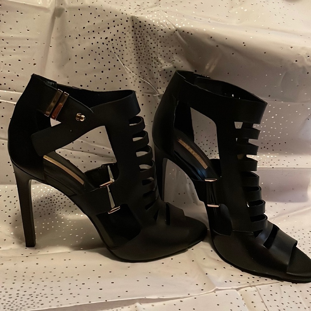 Never worn BCBG BLACK WITH GOLD BUCKLE